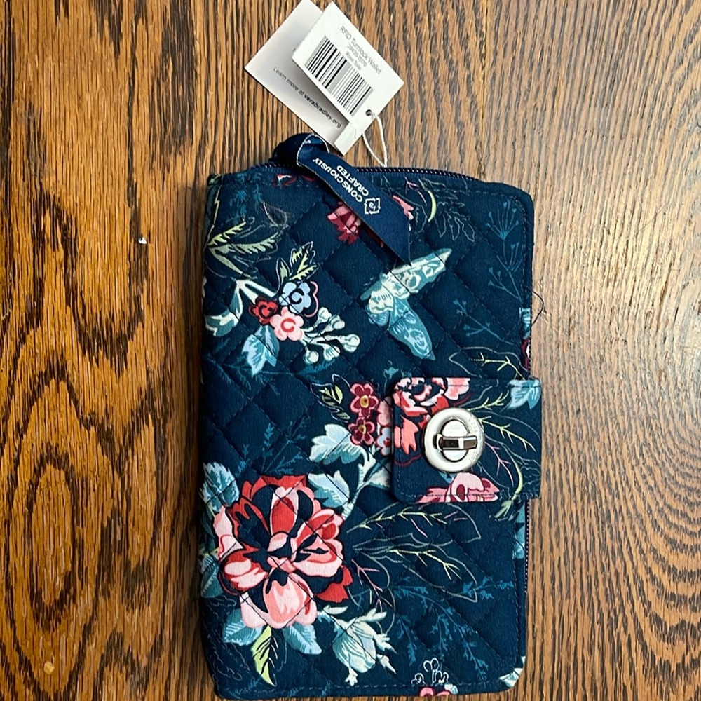 Vera Bradley Clutch/Wallet NWT. Breast cancer item in navy w/ pink rose floral.